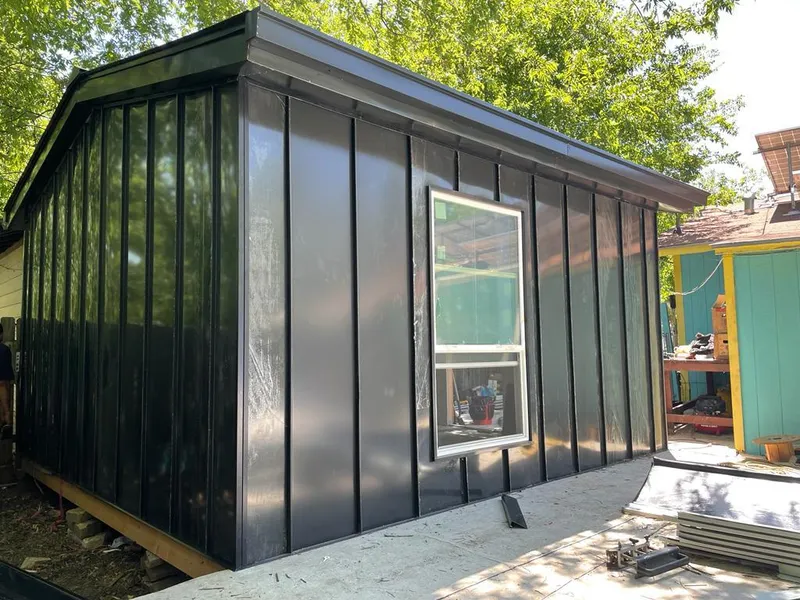 Black standing seam metal wall panels for Metal Roof Installation in Brookhaven